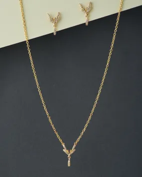 A cute pendant matched with golden polish chain with matching earrings.