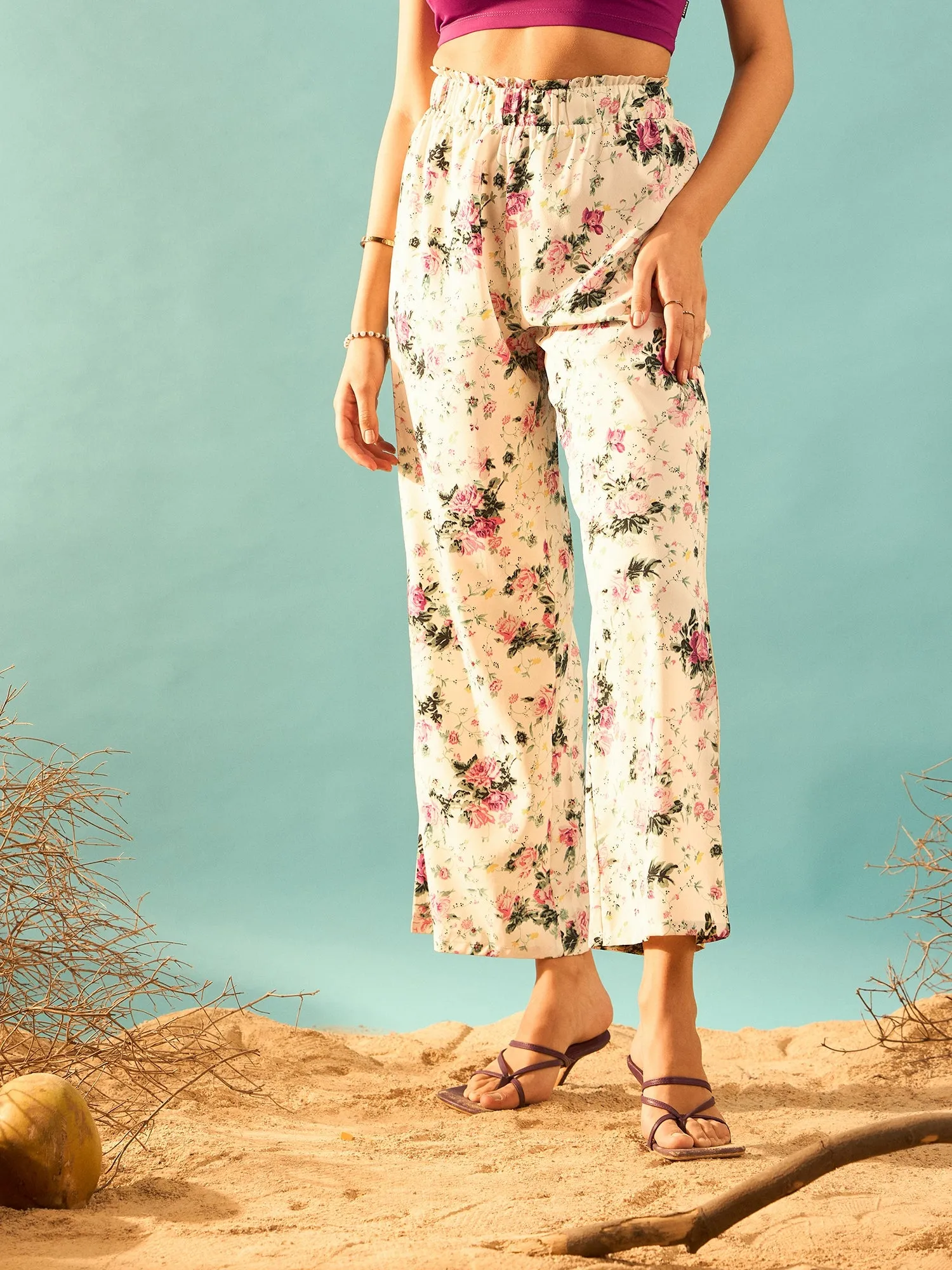 Berrylush Women Beige & Pink Floral Printed High-Rise Elastic Waist Loose-Fit Slip-On Pleated Regular Trousers